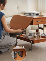 folding side table stored against wall to save floor space 摺疊邊几收起貼牆擺放 節省地面空間