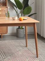 rectangular cherry wood dining table for four