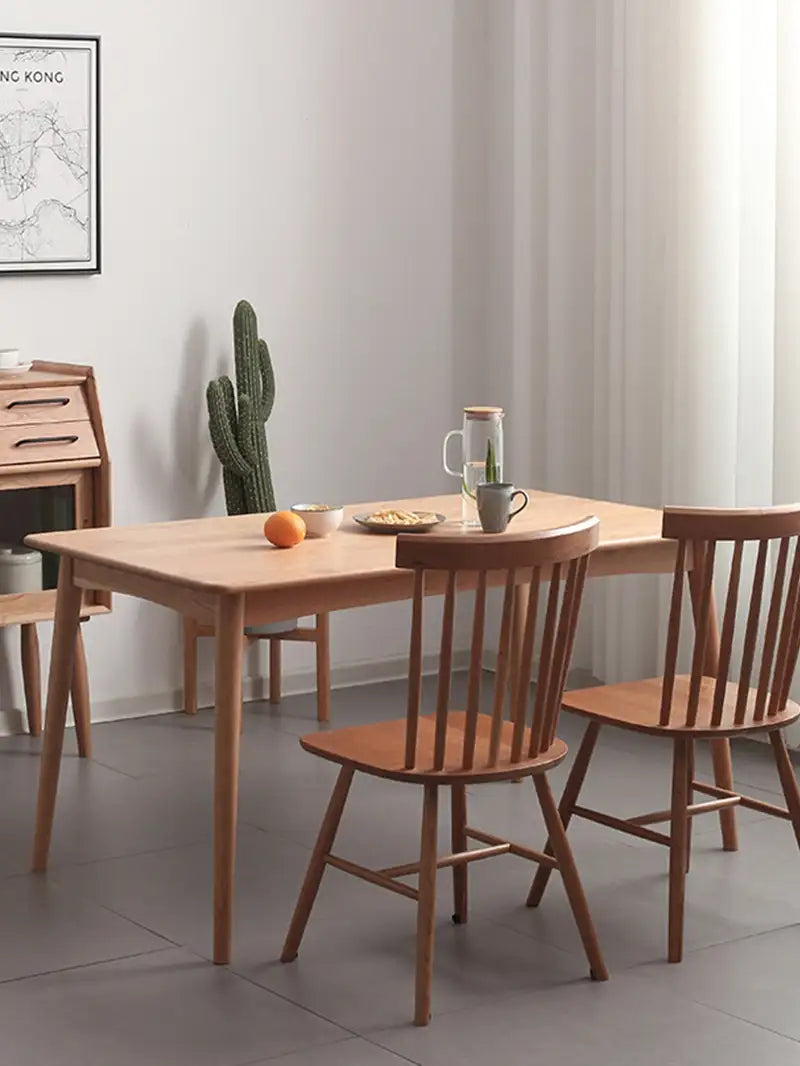 solid wood dining table in minimalist dining room